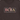 BCBA Outline Tee Dark Chocolate t-shirt, design close-up