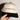 Close-up of the front print on the Black and Natural Don't Apologize for Being You embroidered hat