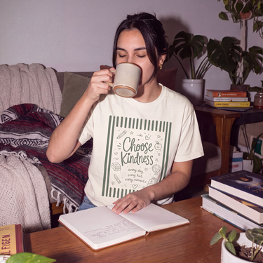 Model wearing the White Choose Kindness boxy tee, front print