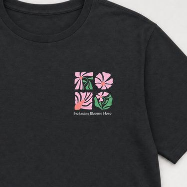 Inclusion Blooms Here Tee Black t-shirt, design close-up