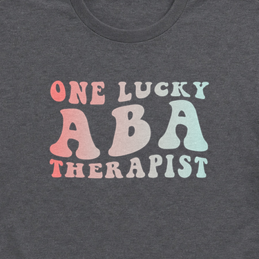 One Lucky ABA Therapist Tee Dark Heather Grey t-shirt, design close-up