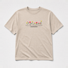 Autism Acceptance Grandma Tee Sand t-shirt, front