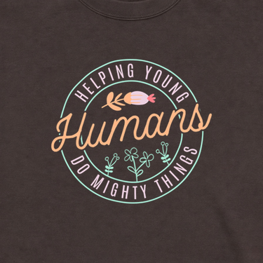 Helping Young Humans Do Mighty Things Sweatshirt Dark Chocolate sweatshirt, design close-up