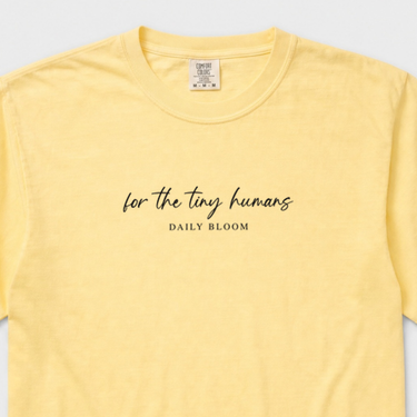 For the Tiny Humans Comfort Colors Tee Butter t-shirt, design close-up