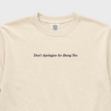 Don't Apologize for Being You Comfort Colors Tee Ivory t-shirt, design close-up