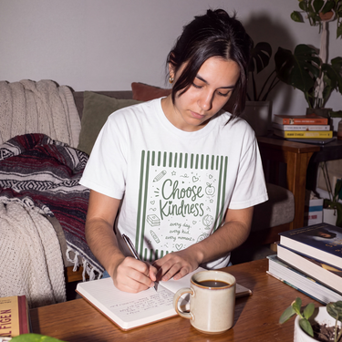 Model wearing the White Choose Kindness Comfort Colors tee, front print