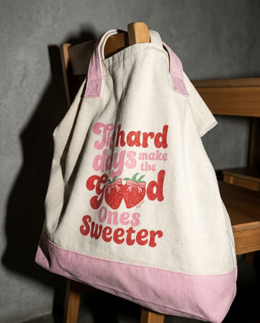 The Natural and Light Pink The Hard Days Make the Good Ones Sweeter zippered tote, front view