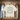 The Ivory Choose Kindness boxy tee on a hanger, front view