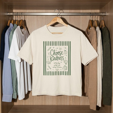 The Ivory Choose Kindness boxy tee on a hanger, front view