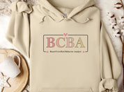 BCBA Outline Heart & Floral Hoodie-Sand-Neurodiversity, ADHD & Autism Awareness & Acceptance Hoodie by Daily Bloom