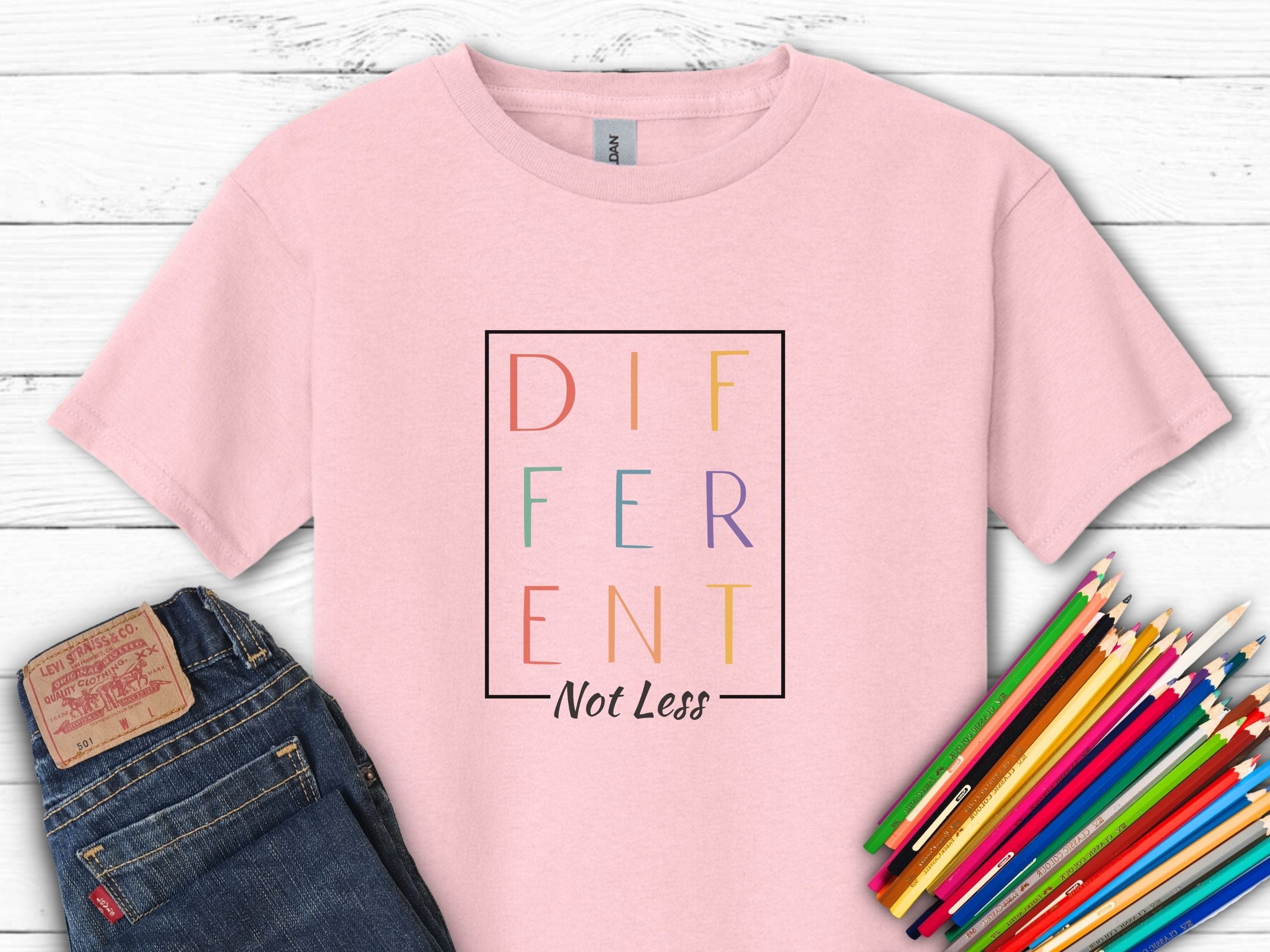 Different Not Less Stacked Letters Kids T-Shirt-Light Pink-Neurodiversity, ADHD & Autism Awareness & Acceptance Kids clothes by Daily Bloom