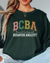 BCBA - Board Certified Behavior Analyst College Style Long Sleeve T-Shirt-Neurodiversity, ADHD & Autism Awareness & Acceptance Long-sleeve by Daily Bloom