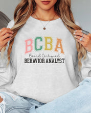 BCBA - Board Certified Behavior Analyst College Style Long Sleeve T-Shirt-Neurodiversity, ADHD & Autism Awareness & Acceptance Long-sleeve by Daily Bloom