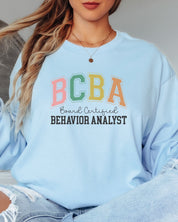 BCBA - Board Certified Behavior Analyst College Style Long Sleeve T-Shirt-Neurodiversity, ADHD & Autism Awareness & Acceptance Long-sleeve by Daily Bloom