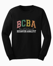 BCBA - Board Certified Behavior Analyst College Style Long Sleeve T-Shirt-Black-Neurodiversity, ADHD & Autism Awareness & Acceptance Long-sleeve by Daily Bloom