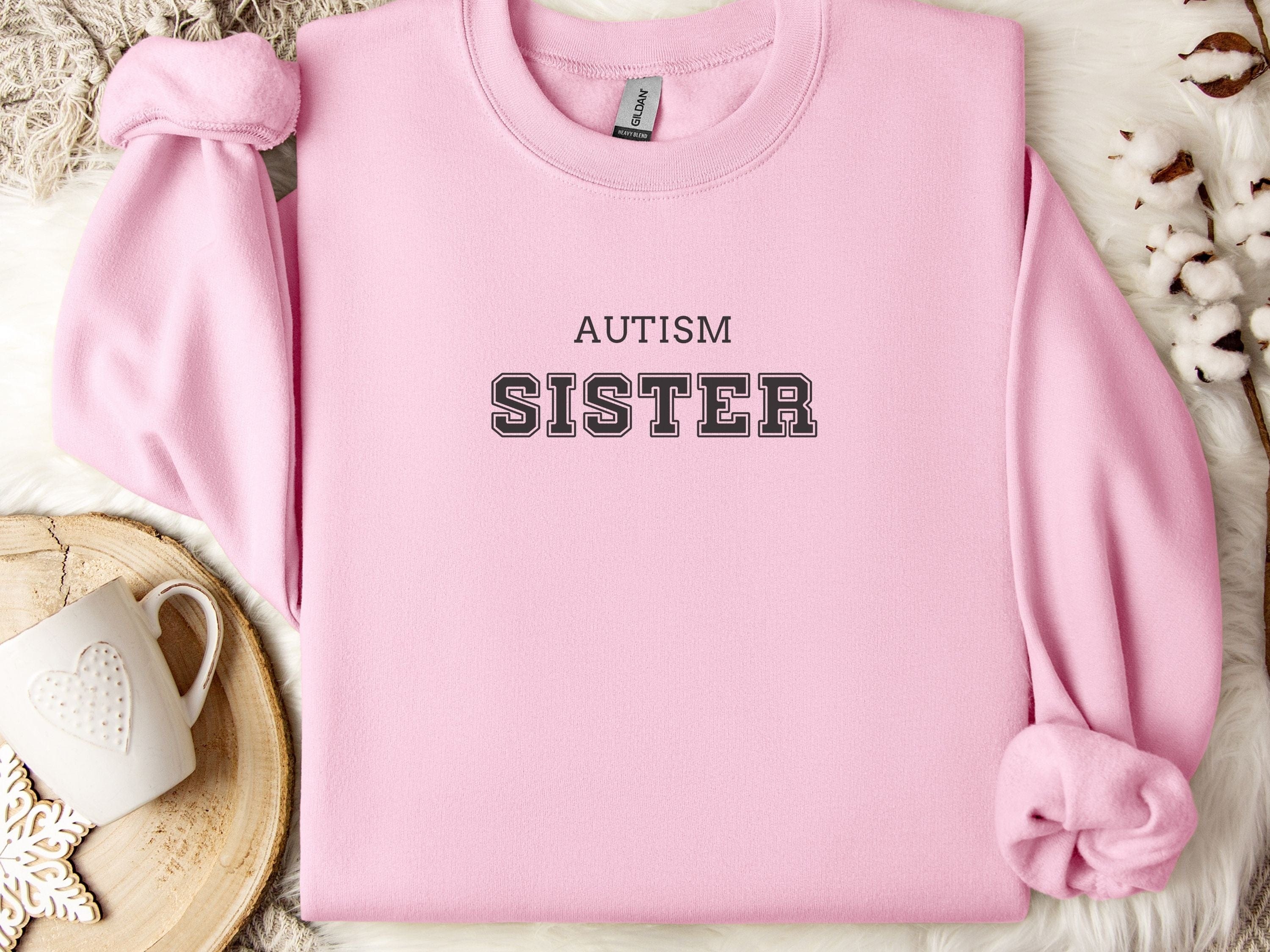 Autism College Sister Sweatshirt-Light Pink-Neurodiversity, ADHD & Autism Awareness & Acceptance Sweatshirt by Daily Bloom