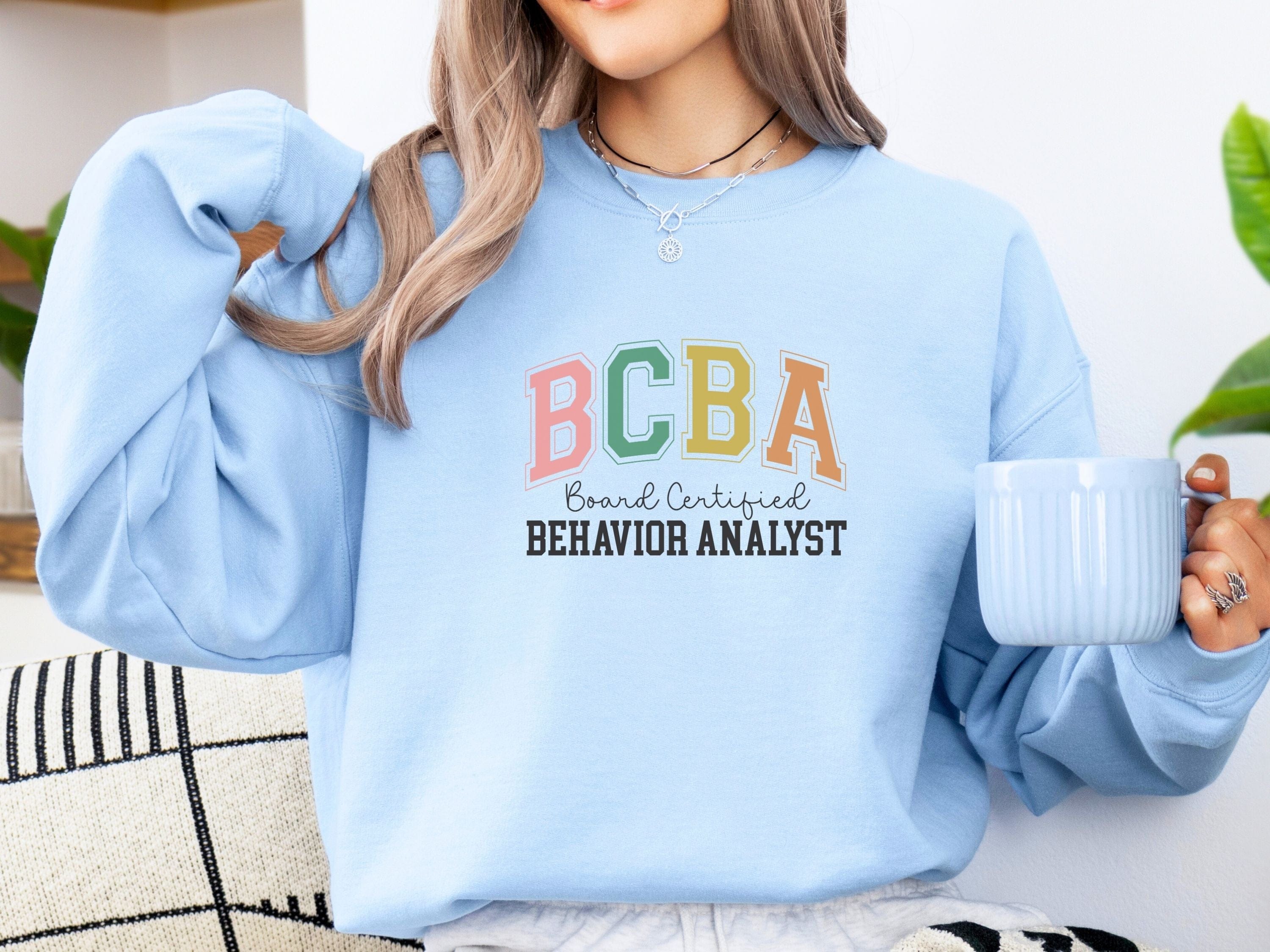 BCBA - Board Certified Behavior Analyst College Style Sweatshirt-Neurodiversity, ADHD & Autism Awareness & Acceptance Sweatshirt by Daily Bloom