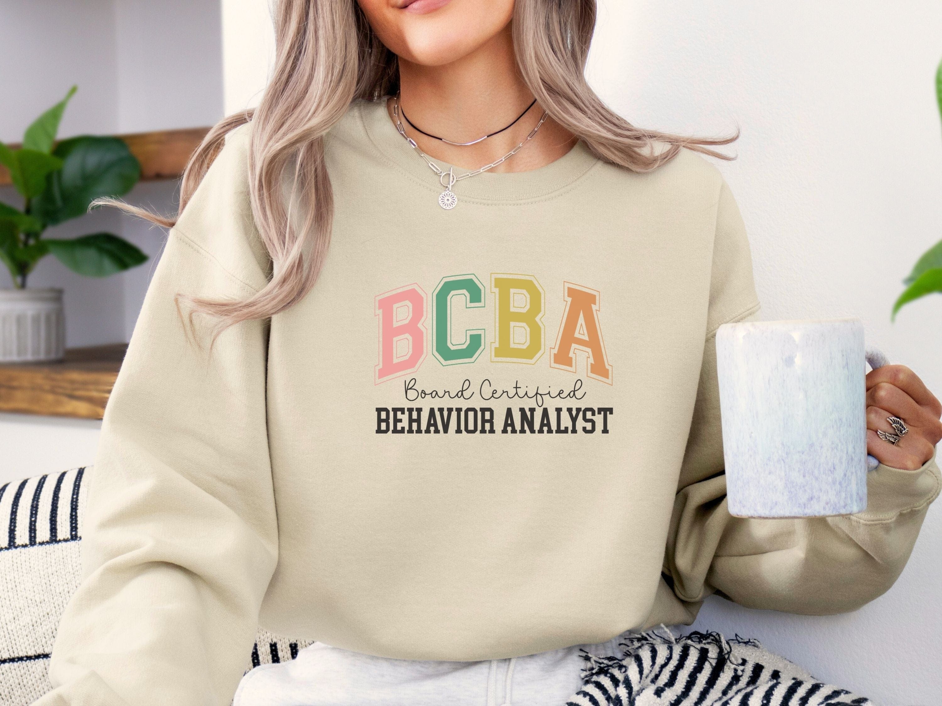 BCBA - Board Certified Behavior Analyst College Style Sweatshirt-Neurodiversity, ADHD & Autism Awareness & Acceptance Sweatshirt by Daily Bloom