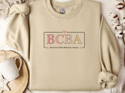 BCBA Outline Sweatshirt-Sand-Neurodiversity, ADHD & Autism Awareness & Acceptance Sweatshirt by Daily Bloom