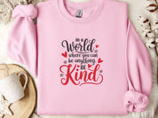 In A World Where You Can Be Anything Be Kind Love Hearts Sweatshirt-Light Pink-Neurodiversity, ADHD & Autism Awareness & Acceptance Sweatshirt by Daily Bloom