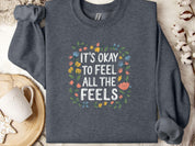 It's Okay To Feel All The Feels Sweatshirt-Dark Heather-Neurodiversity, ADHD & Autism Awareness & Acceptance Sweatshirt by Daily Bloom