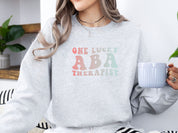 One Lucky ABA Therapist Sweatshirt-Neurodiversity, ADHD & Autism Awareness & Acceptance Sweatshirt by Daily Bloom