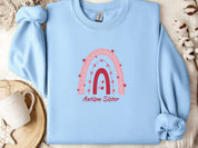 Rainbow Autism Sister Sweatshirt-Light Blue-Neurodiversity, ADHD & Autism Awareness & Acceptance Sweatshirt by Daily Bloom