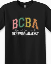 BCBA - Board Certified Behavior Analyst College Style Tee-Neurodiversity, ADHD & Autism Awareness & Acceptance T-Shirt by Daily Bloom