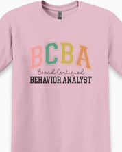 BCBA - Board Certified Behavior Analyst College Style Tee-Neurodiversity, ADHD & Autism Awareness & Acceptance T-Shirt by Daily Bloom