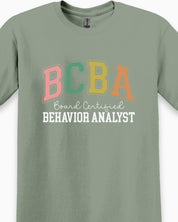 BCBA - Board Certified Behavior Analyst College Style Tee-Neurodiversity, ADHD & Autism Awareness & Acceptance T-Shirt by Daily Bloom