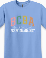 BCBA - Board Certified Behavior Analyst College Style Tee-Neurodiversity, ADHD & Autism Awareness & Acceptance T-Shirt by Daily Bloom