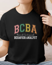 BCBA - Board Certified Behavior Analyst College Style Tee-Neurodiversity, ADHD & Autism Awareness & Acceptance T-Shirt by Daily Bloom