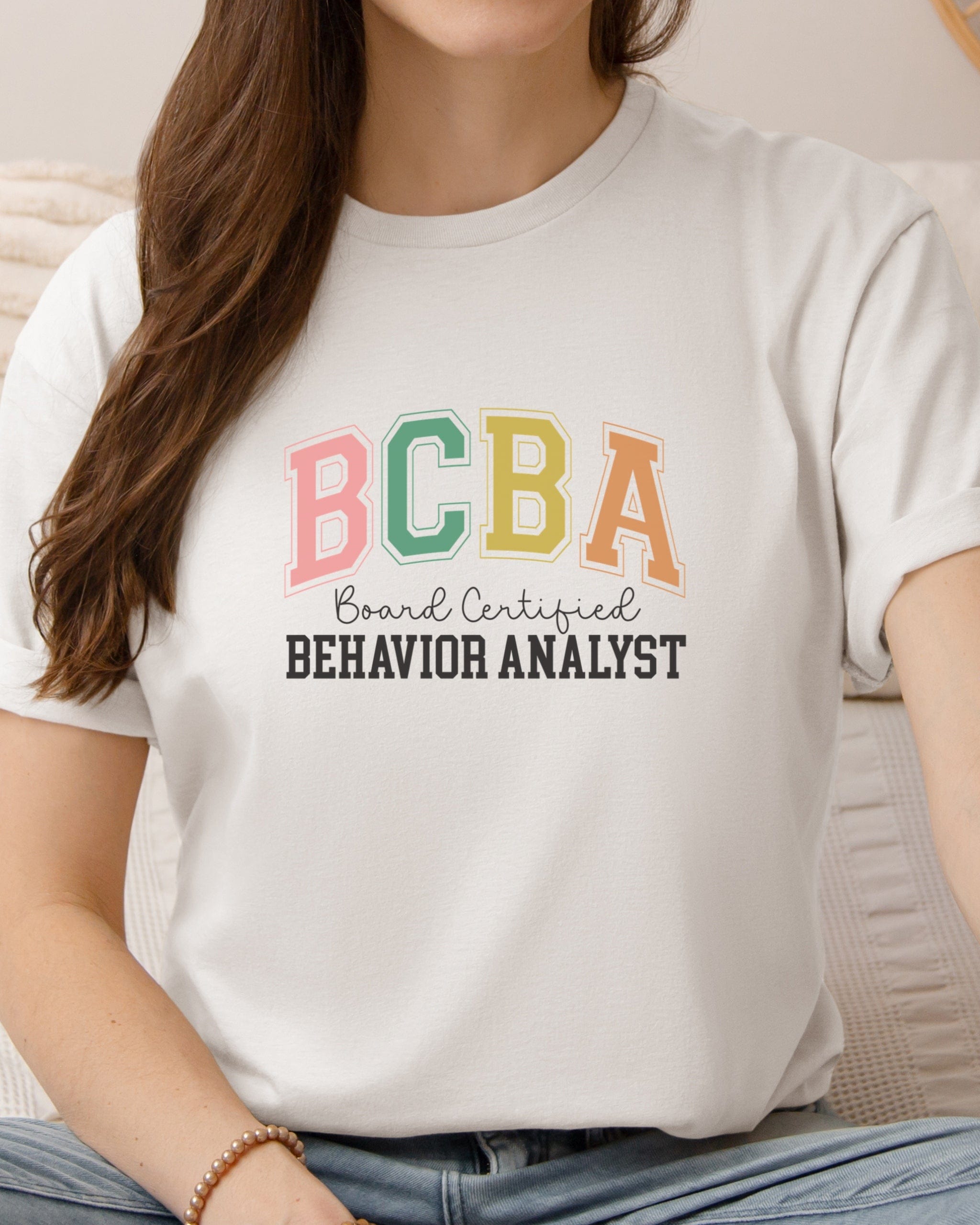 BCBA - Board Certified Behavior Analyst College Style Tee-Neurodiversity, ADHD & Autism Awareness & Acceptance T-Shirt by Daily Bloom