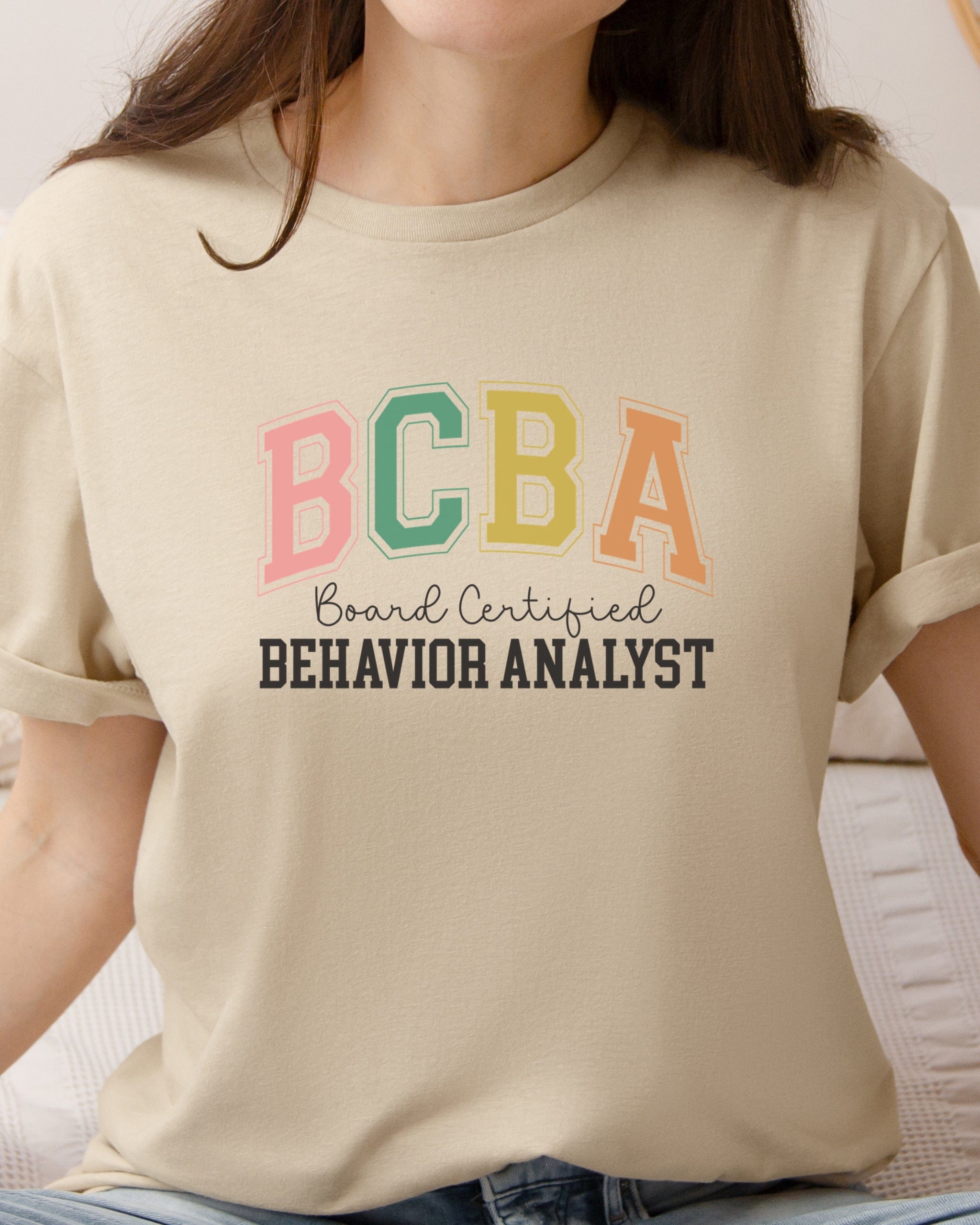 BCBA - Board Certified Behavior Analyst College Style Tee-Neurodiversity, ADHD & Autism Awareness & Acceptance T-Shirt by Daily Bloom