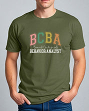 BCBA - Board Certified Behavior Analyst College Style Tee-Neurodiversity, ADHD & Autism Awareness & Acceptance T-Shirt by Daily Bloom