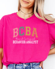 BCBA - Board Certified Behavior Analyst College Style Tee-Neurodiversity, ADHD & Autism Awareness & Acceptance T-Shirt by Daily Bloom