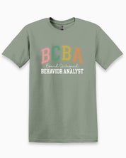 BCBA - Board Certified Behavior Analyst College Style Tee-Sage-Neurodiversity, ADHD & Autism Awareness & Acceptance T-Shirt by Daily Bloom
