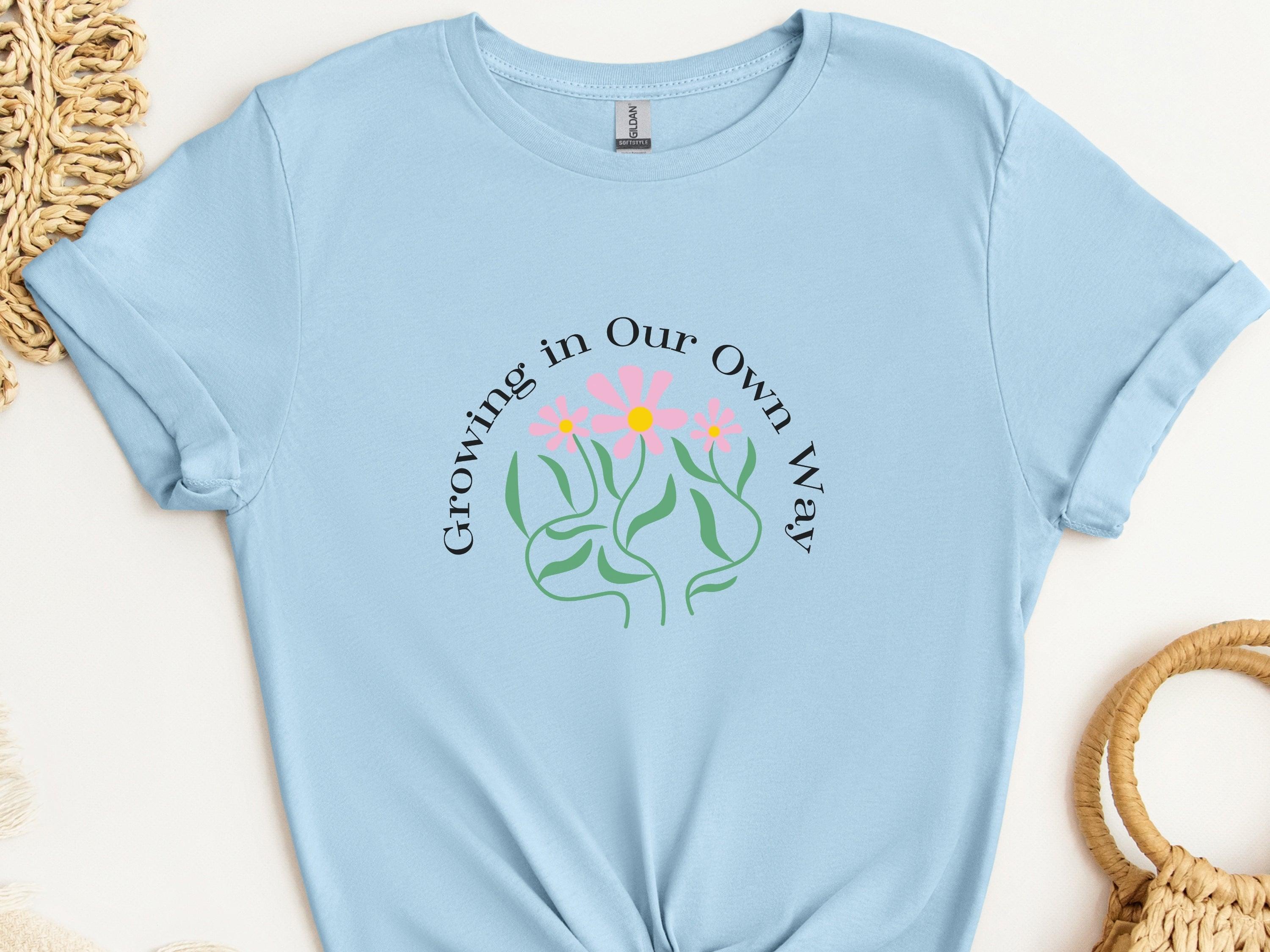 Growing In Our Own Way Tee-Light Blue-Neurodiversity, ADHD & Autism Awareness & Acceptance T-Shirt by Daily Bloom