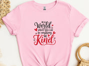 In A World Where You Can Be Anything Be Kind Tee-Light Pink-Neurodiversity, ADHD & Autism Awareness & Acceptance T-Shirt by Daily Bloom