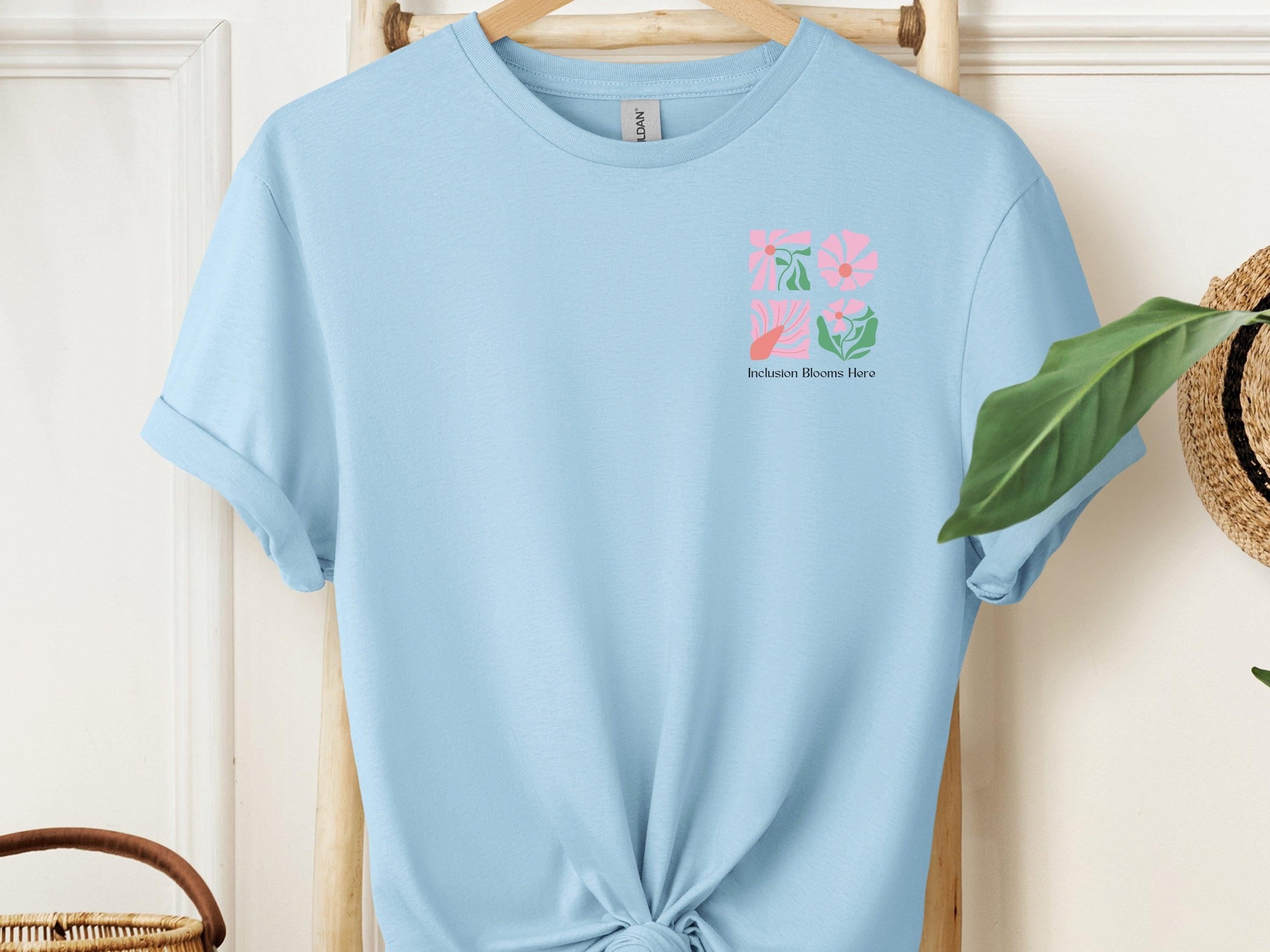 Inclusion Blooms Here Tee-Light Blue-Neurodiversity, ADHD & Autism Awareness & Acceptance T-Shirt by Daily Bloom