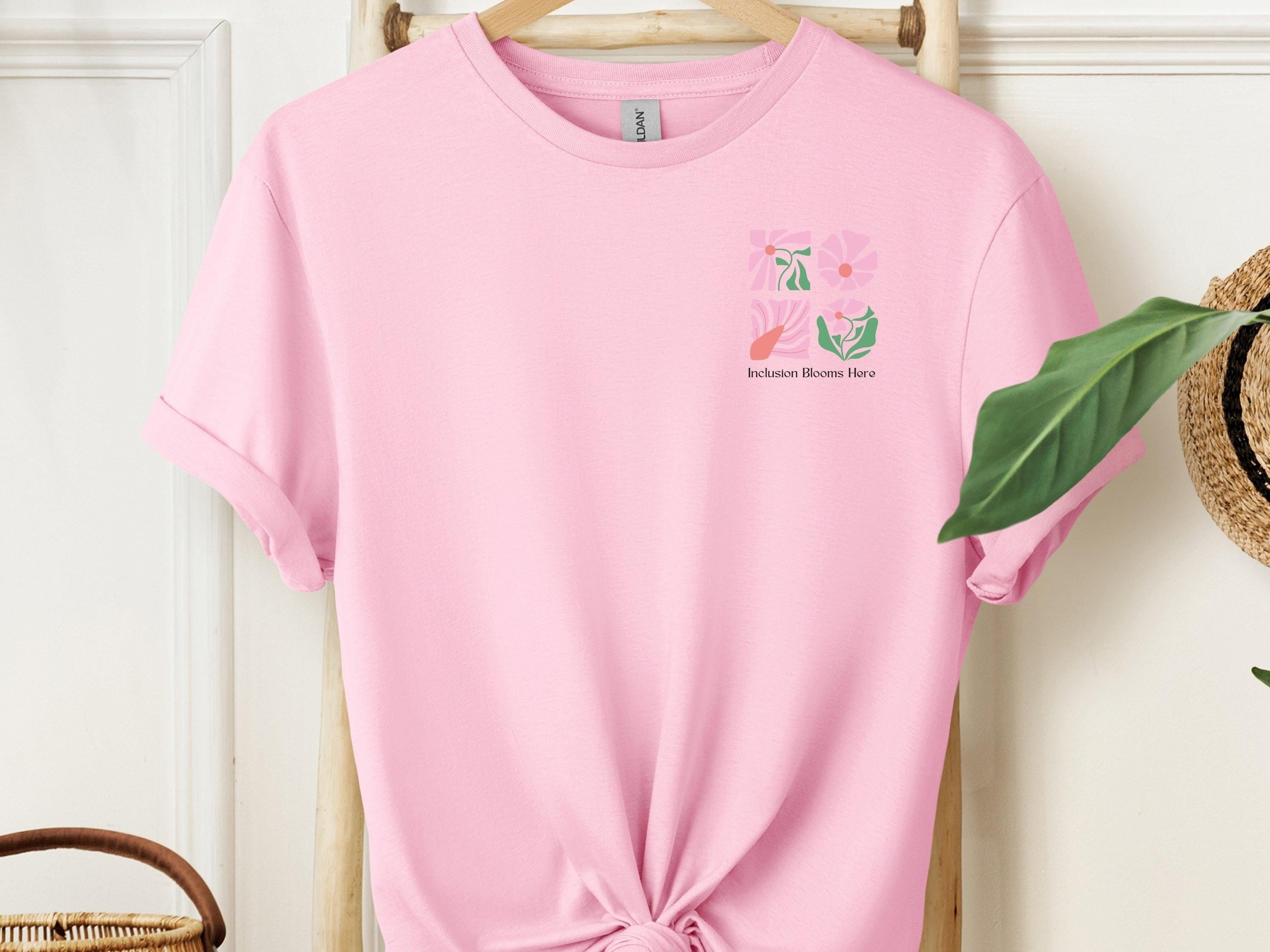 Inclusion Blooms Here Tee-Light Pink-Neurodiversity, ADHD & Autism Awareness & Acceptance T-Shirt by Daily Bloom