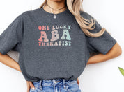 One Lucky ABA Therapist Tee-Neurodiversity, ADHD & Autism Awareness & Acceptance T-Shirt by Daily Bloom
