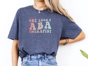 One Lucky ABA Therapist Tee-Neurodiversity, ADHD & Autism Awareness & Acceptance T-Shirt by Daily Bloom
