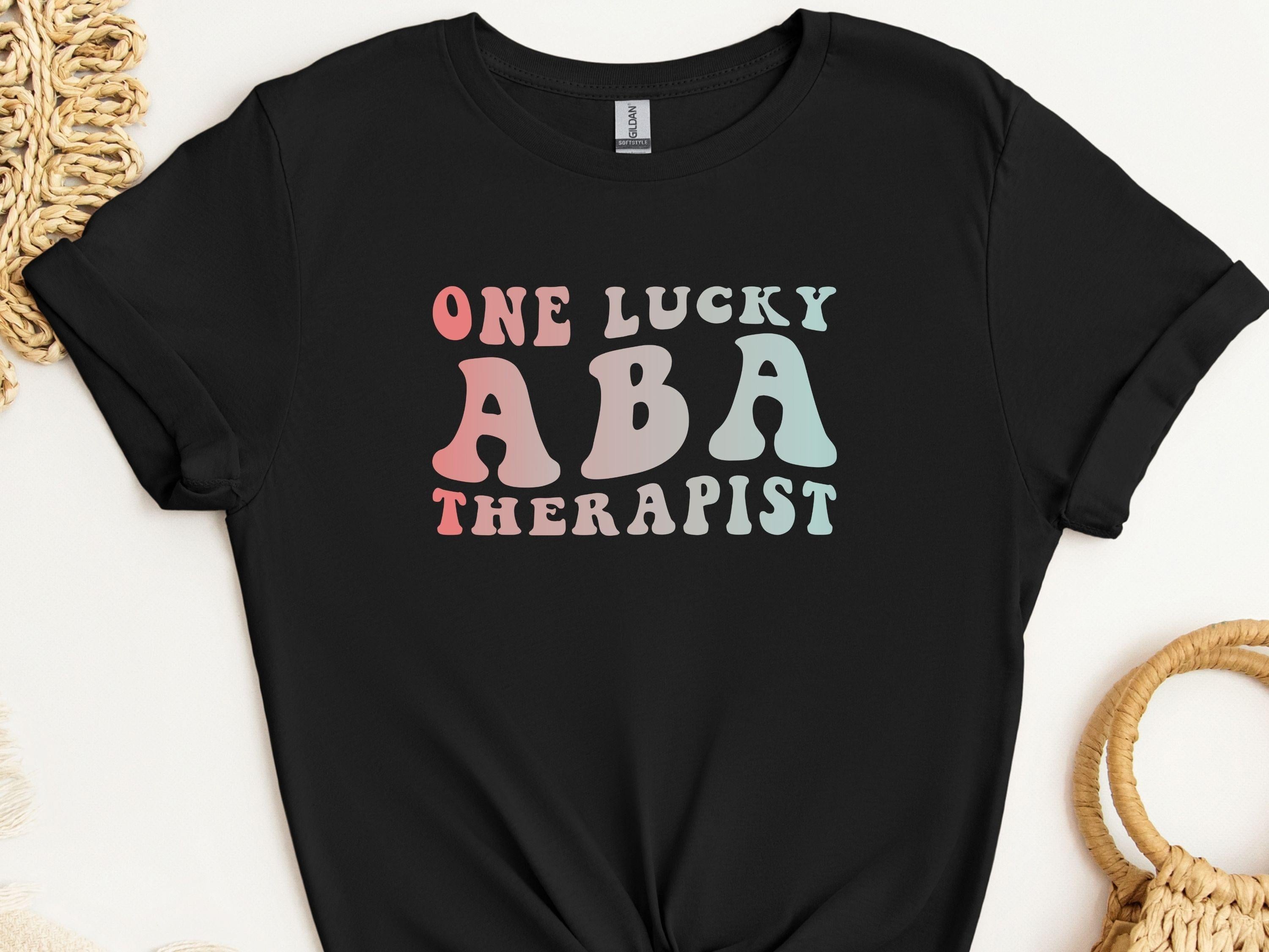 One Lucky ABA Therapist Tee-Black-Neurodiversity, ADHD & Autism Awareness & Acceptance T-Shirt by Daily Bloom
