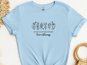 Where Acceptance Grows Love Blooms WildflowersTee-Light Blue-Neurodiversity, ADHD & Autism Awareness & Acceptance T-Shirt by Daily Bloom